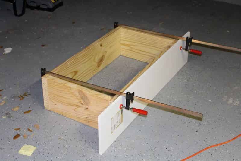 Test fitting the melamine shelving to the collar frame #1