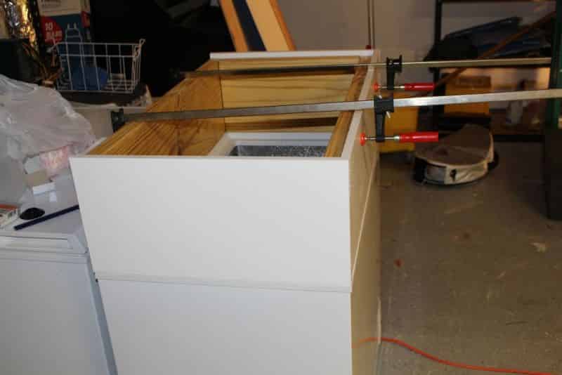 Test fitting the melamine to the collar frame while on freezer #2