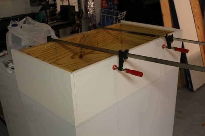 Test fitting the melamine to the collar frame while on freezer #4