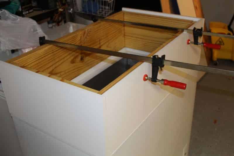 Test fitting the melamine to the collar frame while on freezer #5