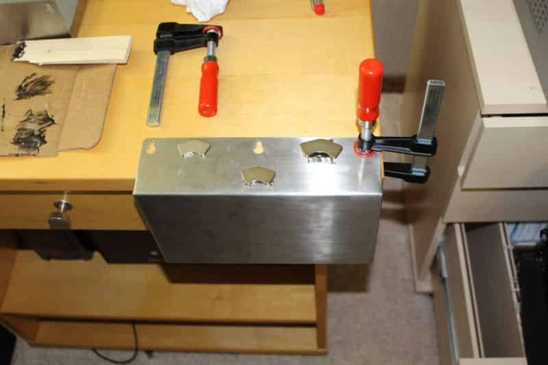 Affixing magnets to drip trays