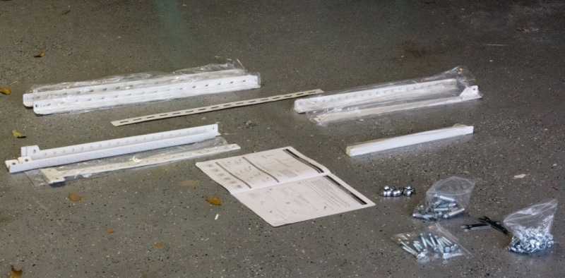 Brackets, Vertical Posts, and lots of nuts and bolts.