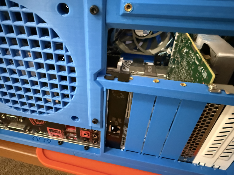 Fitment issue on top PCIe slot requiring revision