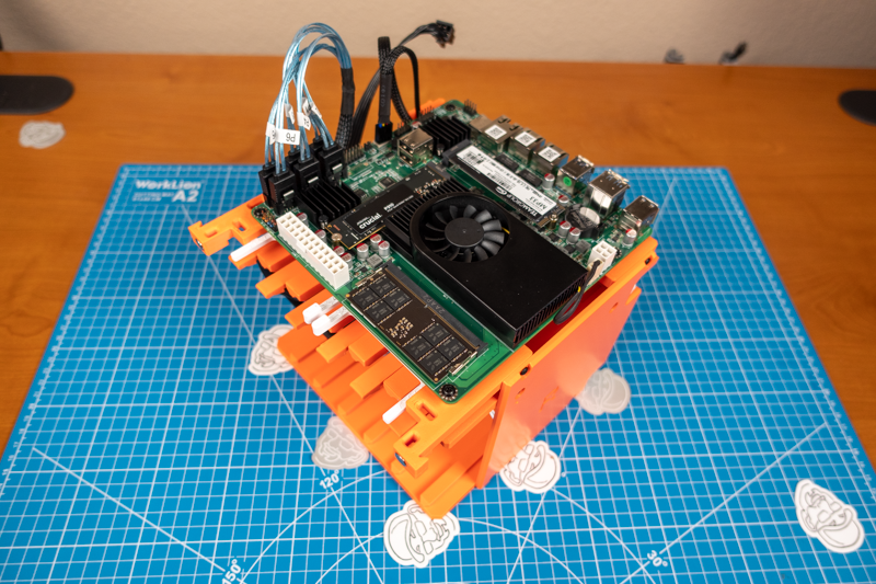 Motherboard, RAM, NVMe SSDs mounted atop drive bay #1
