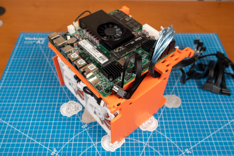 Motherboard, drive bay cooling fans.