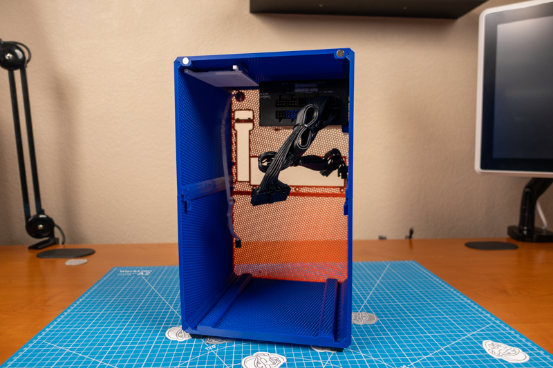 Enclosure with PSU mounted in the top right corner.